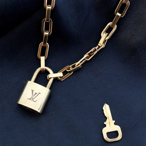 louis vuitton lock necklace fake|louis vuitton necklace dupe.